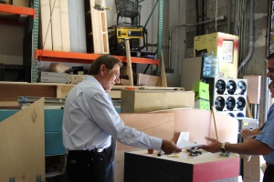 Joe Namath visits the set design workshop at the studios where "The Competitive Edge™" is produced.